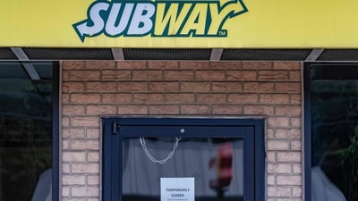 A temporarily closed sign hangs on the door of a Subway outlet. (AFP) A temporarily closed sign hangs on the door of a Subway outlet. (AFP)