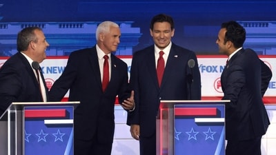 MILWAUKEE, WISCONSIN - AUGUST 23: Republican presidential candidates (L-R), former New Jersey Gov. Chris Christie, former U.S. Vice President Mike Pence, Florida Gov. Ron DeSantis and Vivek Ramaswamy speak during a break in the first debate of the GOP primary season hosted by FOX News at the Fiserv Forum on August 23, 2023 in Milwaukee, Wisconsin. (Getty Images via AFP) MILWAUKEE, WISCONSIN - AUGUST 23: Republican presidential candidates (L-R), former New Jersey Gov. Chris Christie, former U.S. Vice President Mike Pence, Florida Gov. Ron DeSantis and Vivek Ramaswamy speak during a break in the first debate of the GOP primary season hosted by FOX News at the Fiserv Forum on August 23, 2023 in Milwaukee, Wisconsin. (Getty Images via AFP)