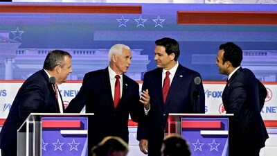 Vivek Ramaswamy, Ron DeSantis, Former Vice President Mike Pence, and Chris Christie during a break at Republican primary presidential debate (Right to left). (Bloomberg) Vivek Ramaswamy, Ron DeSantis, Former Vice President Mike Pence, and Chris Christie during a break at Republican primary presidential debate (Right to left). (Bloomberg)