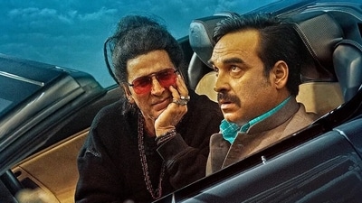 Akshay Kumar and Pankaj Tripathi in a still from OMG 2. Akshay Kumar and Pankaj Tripathi in a still from OMG 2.