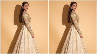 Aditi decked up in a golden sequined cropped blazer and an ivory white skirt with golden zari details at the borders. (Instagram/@aditiraohydari) Aditi decked up in a golden sequined cropped blazer and an ivory white skirt with golden zari details at the borders. (Instagram/@aditiraohydari)