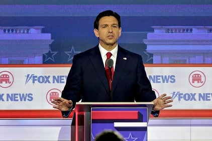 Ron DeSantis, governor of Florida and 2024 Republican presidential candidate, during the Republican primary presidential debate hosted by Fox News in Milwaukee, Wisconsin, US, on Wednesday, Aug. 23, 2023. Republican presidential contenders are facing off in their first debate of the primary season, minus frontrunner Donald Trump, who continues to lead his GOP rivals by a double-digit margin. Photographer: Al Drago/Bloomberg (Bloomberg) Ron DeSantis, governor of Florida and 2024 Republican presidential candidate, during the Republican primary presidential debate hosted by Fox News in Milwaukee, Wisconsin, US, on Wednesday, Aug. 23, 2023. Republican presidential contenders are facing off in their first debate of the primary season, minus frontrunner Donald Trump, who continues to lead his GOP rivals by a double-digit margin. Photographer: Al Drago/Bloomberg (Bloomberg)