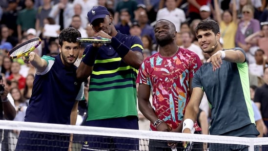 Sebastian Yatra, NBA player Jimmy Butler of the Miami Heat, Frances Tiafoe, and Carlos Alcaraz of Spain participate in the Stars of the Open Exhibition Match (Getty Images/AFP)