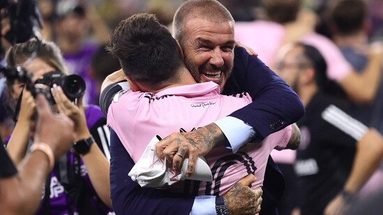 NASHVILLE, TENNESSEE - AUGUST 19: Co-owner David Beckham hugs Lionel Messi #10 of Inter Miami after defeating Nashville SC in penalty shootout to win the Leagues Cup 2023 final match between Inter Miami CF and Nashville SC at GEODIS Park on August 19, 2023 in Nashville, Tennessee. Tim Nwachukwu/Getty Images/AFP (Photo by Tim Nwachukwu / GETTY IMAGES NORTH AMERICA / Getty Images via AFP) (Getty Images via AFP)