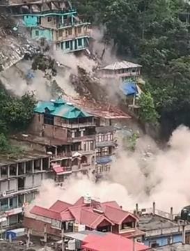 Buildings come crashing down after a landslide struck Anni town of Kullu district on Thursday.