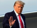 Former President Donald Trump steps off his plane as he arrives at Hartsfield-Jackson Atlanta International Airport on Thursday in Atlanta. (AP Photo) Former President Donald Trump steps off his plane as he arrives at Hartsfield-Jackson Atlanta International Airport on Thursday in Atlanta. (AP Photo)
