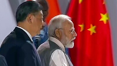 Prime Minister Narendra Modi and Chinese President Xi Jinping engage in a brief interaction at the 15th BRICS Summit, in Johannesburg on Thursday. (ANI) Prime Minister Narendra Modi and Chinese President Xi Jinping engage in a brief interaction at the 15th BRICS Summit, in Johannesburg on Thursday. (ANI)
