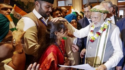 PM Modi interacted with children and their parents at the hotel.&nbsp; (ANI/ PIB )