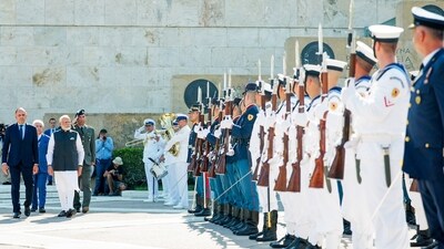 In this photo, PM Modi can be seen being accorded a Ceremonial Guard of Honour on his arrival in Athens. (ANI/ PIB )