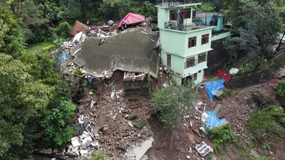Buildings are seen collapsed following heavy rains in Mandi, Himachal Pradesh. (AP) Buildings are seen collapsed following heavy rains in Mandi, Himachal Pradesh. (AP)