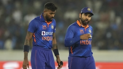 India's Hardik Pandya, left, listens to captain Rohit Sharma (AP) India's Hardik Pandya, left, listens to captain Rohit Sharma (AP)