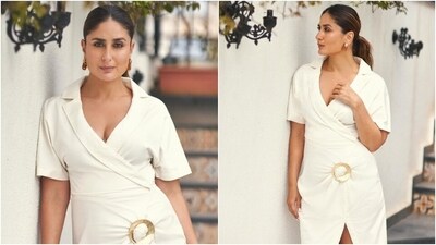 She accessorised the ensemble with gold statement earrings and olive green pumps with high heels. In the end, Kareena chose subtle smoky eye shadow, kohl-lined eyes, nude lip shade, feathered brows, and minimal glam for the glam picks. (HT Photo/Varinder Chawla) She accessorised the ensemble with gold statement earrings and olive green pumps with high heels. In the end, Kareena chose subtle smoky eye shadow, kohl-lined eyes, nude lip shade, feathered brows, and minimal glam for the glam picks. (HT Photo/Varinder Chawla)