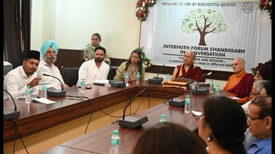 Leaders of various faiths participating in a conversation organised by Bodhicitta Centre at People Convention Centre in Sector 36, Chandigarh, on Friday. (Sanjeev Sharma/HT)