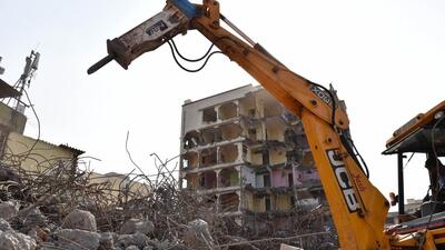 Navi Mumbai, India-October 08:MIDC-NMMC conflict over Digha demolition cost – MIDC constructs boundary on NMMC land in Navi Mumbai India on Thursday 08,2015 (Photo By Bachchan kumar / HindustanTimes) Navi Mumbai, India-October 08:MIDC-NMMC conflict over Digha demolition cost – MIDC constructs boundary on NMMC land in Navi Mumbai India on Thursday 08,2015 (Photo By Bachchan kumar / HindustanTimes)