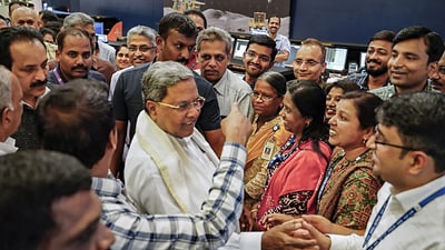 Bengaluru: Karnataka Chief Minister Siddaramaiah congratulates ISRO scientists after the successful soft landing of ISRO's Chandrayaan-3 on the surface of the Moon, at the ISRO center, Peenya, in Bengaluru, Thursday, Aug. 24, 2023. (PTI Photo)