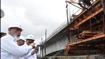 Public Works Minister Dada Bhuse inspecting the ongoing work on the third Vashi Creek Bridge on Thursday in Navi Mumbai (Bachchan Kumar/HT PHOTO) Public Works Minister Dada Bhuse inspecting the ongoing work on the third Vashi Creek Bridge on Thursday in Navi Mumbai (Bachchan Kumar/HT PHOTO)