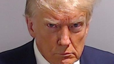 Former U.S. President Donald Trump is shown in a police booking mugshot released by the Fulton County Sheriff's Office. (via Reuters)