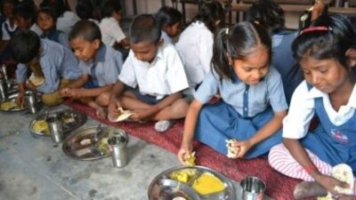 Students having meals in a school. (PTI File) Students having meals in a school. (PTI File)