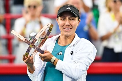 Jessica Pegula of the United States of America holds up the National Bank Open trophy after her 6-1, 6-0 victory against Liudmila Samsonova in the final round on Day 7 during the National Bank Open at Stade IGA on August 13, 2023 (Getty Images via AFP) Jessica Pegula of the United States of America holds up the National Bank Open trophy after her 6-1, 6-0 victory against Liudmila Samsonova in the final round on Day 7 during the National Bank Open at Stade IGA on August 13, 2023 (Getty Images via AFP)