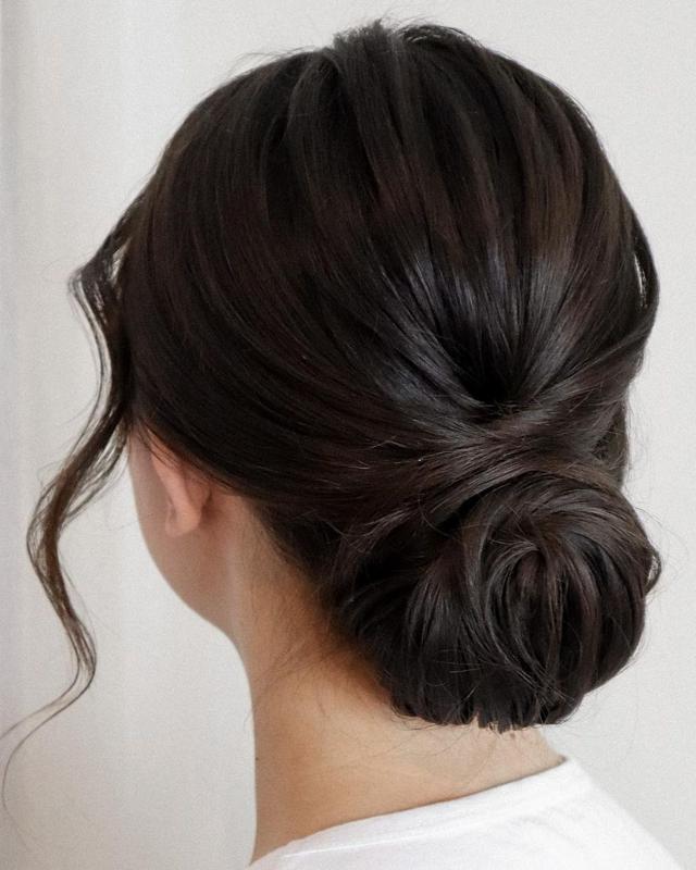 Opt for a low bun with a twist that can seamlessly transition from work to a night out (Photo: Instagram)