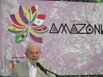 (FILES) Brazil's President Luiz Inacio Lula da Silva gives a statement to the press during the Amazon Summit at the Hangar Convention Centre in Belem, Para State, Brazil, on August 9, 2023. The timing spoke volumes: just as Ecuador announced on August 21, 2023, its historic decision to halt oil drilling in a sensitive Amazon rainforest reserve, Brazil trumpeted its massive fossil-fuel investment plans, which include oil exploration near the mouth of the Amazon river. Oil is an increasingly uncomfortable subject for Brazilian President Luiz Inacio Lula da Silva, who casts himself as a climate crusader but also faces criticism for his plans to grow Latin America's biggest economy with fossil fuels. (Photo by Evaristo SA / AFP) (FILES) Brazil's President Luiz Inacio Lula da Silva gives a statement to the press during the Amazon Summit at the Hangar Convention Centre in Belem, Para State, Brazil, on August 9, 2023. The timing spoke volumes: just as Ecuador announced on August 21, 2023, its historic decision to halt oil drilling in a sensitive Amazon rainforest reserve, Brazil trumpeted its massive fossil-fuel investment plans, which include oil exploration near the mouth of the Amazon river. Oil is an increasingly uncomfortable subject for Brazilian President Luiz Inacio Lula da Silva, who casts himself as a climate crusader but also faces criticism for his plans to grow Latin America's biggest economy with fossil fuels. (Photo by Evaristo SA / AFP)