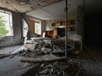 A destroyed apartment in a heavily damaged residential building following Russian strikes in Kharkiv