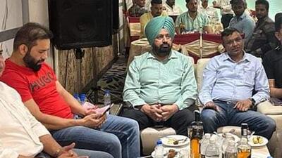 (From left) Gangster Kamal Kumar alias Bori , ADCP (detective) Harjit Singh Dhaliwal and inspector Neeraj Kumar during the birthday party in Amritsar. (HT Photo) (From left) Gangster Kamal Kumar alias Bori , ADCP (detective) Harjit Singh Dhaliwal and inspector Neeraj Kumar during the birthday party in Amritsar. (HT Photo)
