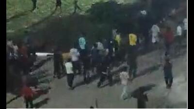 A purported video of the incident doing rounds on social media showed that a bunch of students were roaming around the campus carrying swords. (Video grab) A purported video of the incident doing rounds on social media showed that a bunch of students were roaming around the campus carrying swords. (Video grab)
