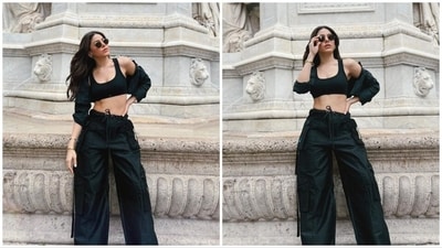 On day 2 in Paris, Alaya F opts for an all-black attire, combining a crop top, baggy cargo pants, and a cropped jacket. (Instagram/@alayaf) On day 2 in Paris, Alaya F opts for an all-black attire, combining a crop top, baggy cargo pants, and a cropped jacket. (Instagram/@alayaf)