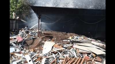 Firefighters dousing the flames at the scrap warehouse in Daria village, Chandigarh. (Sant Arora/HT)