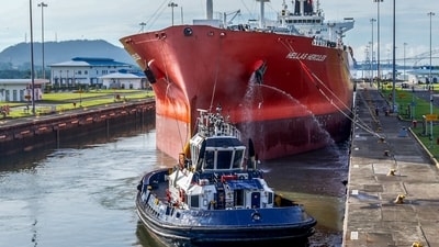 A cargo ship navigates through the Panama Canal in the area of the Cocoli Locks, in Panama City on Agust 25, 2023. The drought-hit Panama Canal will maintain restrictions on the passage of ships for one year, a measure that has already led to a marine traffic jam as boats line up to enter the crucial waterway linking two oceans, an official said late Thursday. (AFP) A cargo ship navigates through the Panama Canal in the area of the Cocoli Locks, in Panama City on Agust 25, 2023. The drought-hit Panama Canal will maintain restrictions on the passage of ships for one year, a measure that has already led to a marine traffic jam as boats line up to enter the crucial waterway linking two oceans, an official said late Thursday. (AFP)