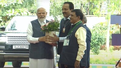 PM Modi being welcomed by ISRO Chairman S. Somanath upon his arrival to meet ISRO scientists following the successful soft landing of Chandrayaan-3 on the surface of the Moon in Bengaluru. (PTI)