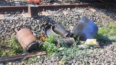 An LPG cylinder and other items at the spot where a fire broke out in a stationary coach of a train at Madurai railway station. (PTI) An LPG cylinder and other items at the spot where a fire broke out in a stationary coach of a train at Madurai railway station. (PTI)