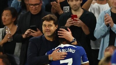 Chelsea's Raheem Sterling with manager Mauricio Pochettino (Action Images via Reuters)