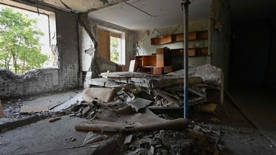 A destroyed apartment in a heavily damaged residential building following Russian strikes in Kharkiv (AFP)