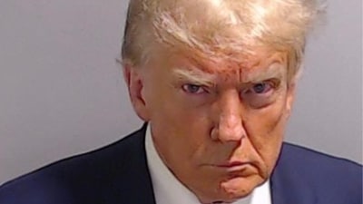 This handout image released by the Fulton County Sheriff's Office on August 24, 2023 shows the booking photo of former US President Donald Trump. Former US president Donald Trump was photographed for a police mug shot after his arrest on August 24 at the Fulton County Jail in Georgia, multiple US media outlets reported citing local officials.
The picture, which has yet to be released, is set to become a world-famous image as Trump fights multiple criminal cases at the same time as running to regain the White House in next year's election. (Photo by FULTON COUNTY SHERIFF'S OFFICE / AFP) / RESTRICTED TO EDITORIAL USE - MANDATORY CREDIT "AFP PHOTO / FULTON COUNTY SHERIFF'S OFFICE " - NO MARKETING - NO ADVERTISING CAMPAIGNS - DISTRIBUTED AS A SERVICE TO CLIENTS (AFP) This handout image released by the Fulton County Sheriff's Office on August 24, 2023 shows the booking photo of former US President Donald Trump. Former US president Donald Trump was photographed for a police mug shot after his arrest on August 24 at the Fulton County Jail in Georgia, multiple US media outlets reported citing local officials.
The picture, which has yet to be released, is set to become a world-famous image as Trump fights multiple criminal cases at the same time as running to regain the White House in next year's election. (Photo by FULTON COUNTY SHERIFF'S OFFICE / AFP) / RESTRICTED TO EDITORIAL USE - MANDATORY CREDIT "AFP PHOTO / FULTON COUNTY SHERIFF'S OFFICE " - NO MARKETING - NO ADVERTISING CAMPAIGNS - DISTRIBUTED AS A SERVICE TO CLIENTS (AFP)