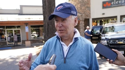 US President Joe Biden speaks to reporters after taking a Pilates class in South Lake Tahoe in California. (REUTERS)