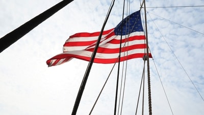 NEW YORK, NEW YORK - JUNE 14: An American flag is seen waving in the wind aboard the Wavertree during a naturalization ceremony on June 14, 2023 in New York City. U.S. Citizenship and Immigration Services and the South Street Seaport Museum celebrated Flag Day by welcoming 20 new U.S. citizens by hosting a naturalization ceremony aboard the 1885 Tall Ship Wavertree. The 20 candidates were from 17 countries and 5 of the candidates are current or former members of the U.S. Military. (Getty Images via AFP) NEW YORK, NEW YORK - JUNE 14: An American flag is seen waving in the wind aboard the Wavertree during a naturalization ceremony on June 14, 2023 in New York City. U.S. Citizenship and Immigration Services and the South Street Seaport Museum celebrated Flag Day by welcoming 20 new U.S. citizens by hosting a naturalization ceremony aboard the 1885 Tall Ship Wavertree. The 20 candidates were from 17 countries and 5 of the candidates are current or former members of the U.S. Military. (Getty Images via AFP)