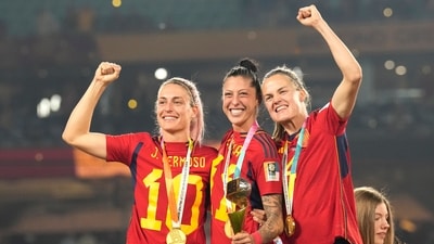 Spain's Alexia Putellas, Jennifer Hermoso and Irene Paredes ,from left, celebrate with the trophy at the end of the Women's World Cup soccer final between Spain and England at Stadium Australia in Sydney, Australia, Sunday, Aug. 20, 2023. Spain won 1-0. (AP) Spain's Alexia Putellas, Jennifer Hermoso and Irene Paredes ,from left, celebrate with the trophy at the end of the Women's World Cup soccer final between Spain and England at Stadium Australia in Sydney, Australia, Sunday, Aug. 20, 2023. Spain won 1-0. (AP)