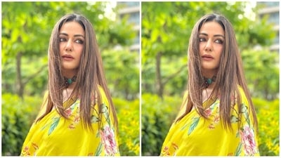 She left her lush, straight locks loose in the centre parting, which cascaded beautifully down her shoulder and complemented her glam look perfectly. (Instagram/@realhinakhan) She left her lush, straight locks loose in the centre parting, which cascaded beautifully down her shoulder and complemented her glam look perfectly. (Instagram/@realhinakhan)