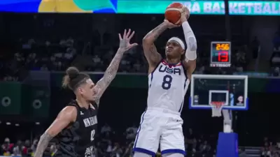 U.S. forward Paolo Banchero (8) shoots over New Zealand forward Isaac Fotu (42) during the second half of a Basketball World Cup group C match in Manila, Saturday, Aug. 26, 2023. (Pic Source: X/@WFXRsports) U.S. forward Paolo Banchero (8) shoots over New Zealand forward Isaac Fotu (42) during the second half of a Basketball World Cup group C match in Manila, Saturday, Aug. 26, 2023. (Pic Source: X/@WFXRsports)