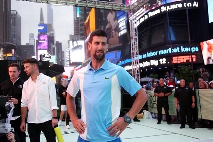 Serbian tennis player Novak Djokovic arrives at a pop-up tennis court during a US Open tennis event at Times Square in New York on August 24, 2023 (AFP) Serbian tennis player Novak Djokovic arrives at a pop-up tennis court during a US Open tennis event at Times Square in New York on August 24, 2023 (AFP)