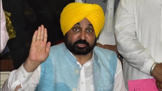 Punjab chief minister Bhagwant Mann accused governor Banwarilal Purohit of “deliberately threatening” 35 million Punjabis and trying to “make fun” of people’s mandate. (PTI)