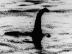 This undated file photo shows a shadowy shape that some people say is a the Loch Ness monster in Scotland, later debunked as a hoax.