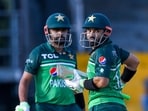 Pakistan's Mohammad Rizwan and Babar Azam (L) run between the wickets during the third and final ODI vs Afghanistan