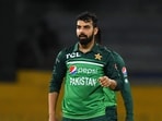 Pakistan's Shadab Khan (R) looks towards Afghanistan's Shahidullah Kamal (L) after dismissing him during the third ODI Pakistan's Shadab Khan (R) looks towards Afghanistan's Shahidullah Kamal (L) after dismissing him during the third ODI