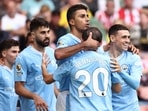 Spanish midfielder #16 Rodri (C) celebrates his go-ahead goal with Manchester City's Portuguese midfielder #20 Bernardo Silva Spanish midfielder #16 Rodri (C) celebrates his go-ahead goal with Manchester City's Portuguese midfielder #20 Bernardo Silva