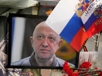 A portrait of the owner of private military company Wagner Group Yevgeny Prigozhin lays at an informal street memorial near the Kremlin in Moscow, Russia, Saturday.
