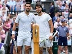 Serbia's Novak Djokovic, left, and Spain's Carlos Alcaraz pose for a photo ahead of the final of the men's singles on day fourteen of the Wimbledon tennis championships in London Serbia's Novak Djokovic, left, and Spain's Carlos Alcaraz pose for a photo ahead of the final of the men's singles on day fourteen of the Wimbledon tennis championships in London