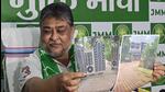 The JMM released photos of an unidentified building, challenging state BJP president Babulal Marandi to clarify his connection (HT Photo)